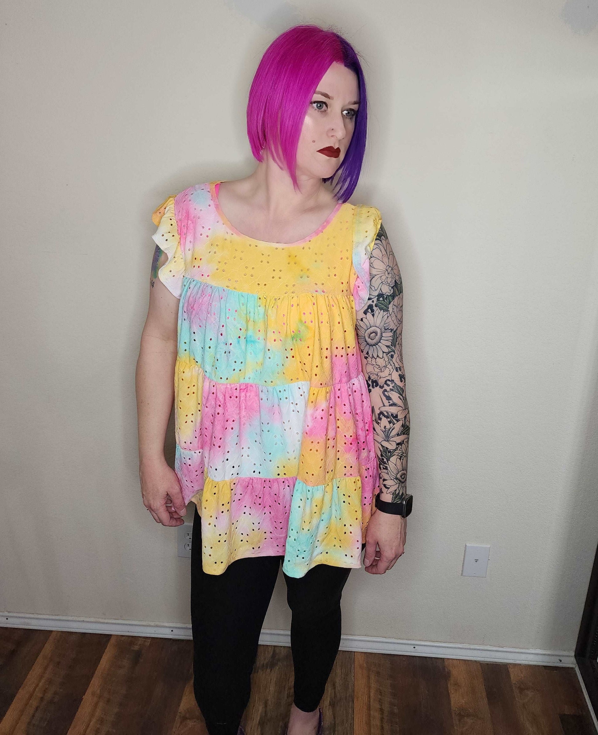 Yellow pink blue and white tie dye baby doll style top.