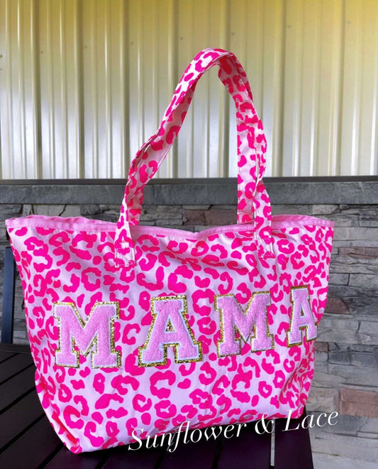 Pink leopard bag with the word Mama on it. 