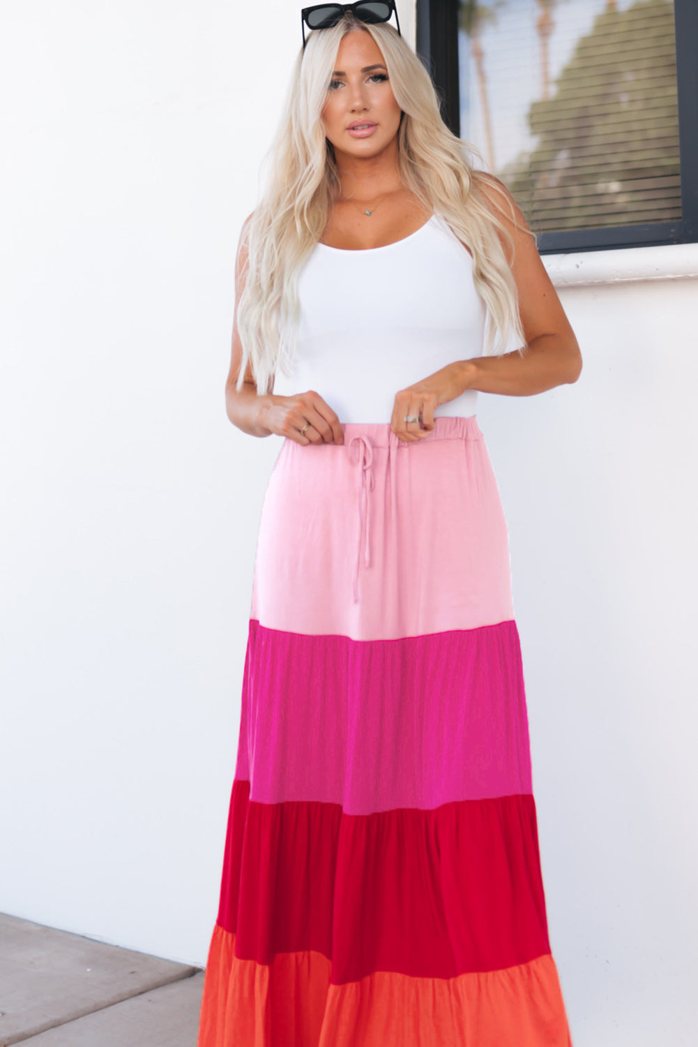 Light pink, hot pink, red, coral tiered skirt. Drawstring elastic waist.