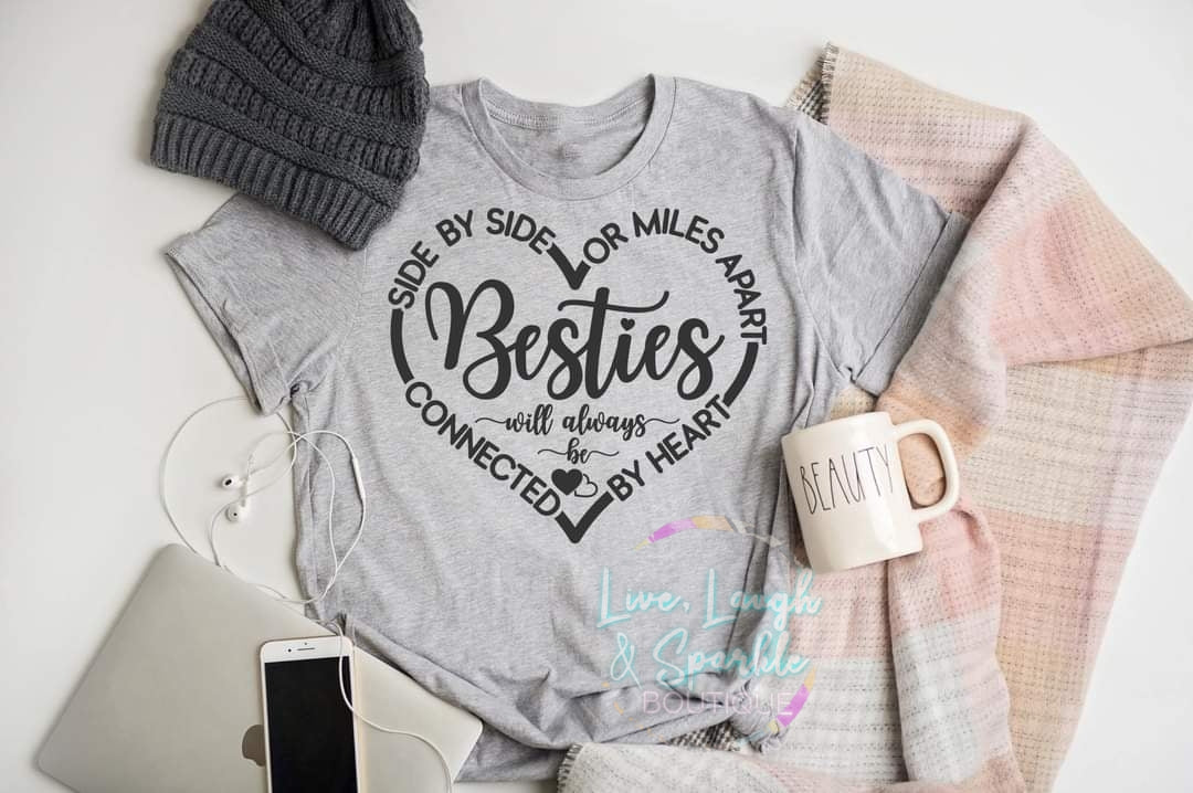 Gray t-shirt with the word Besties on it with a heart around the word.