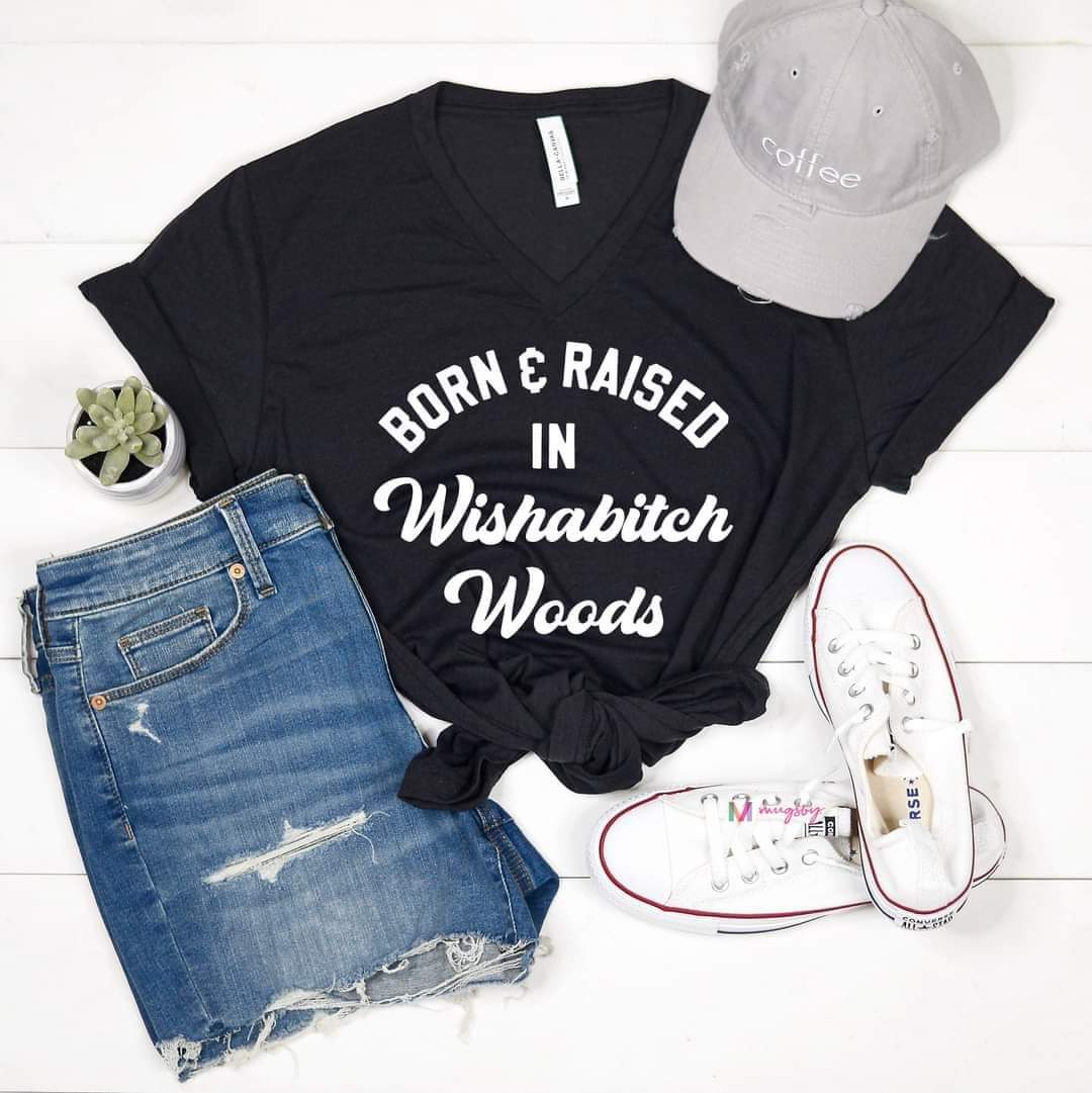 Black v-neck tee with words born & raised in wishabitch woods.
