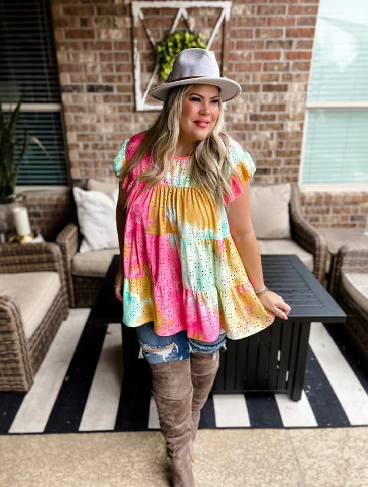 Yellow pink blue and white tie dye baby doll style top.